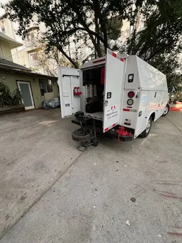 Magnet Plumbing service vehicle on-site for Water Heater Repair in Coral Ridge